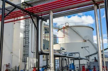 Storage tanks and industrial piping at biofuel plant